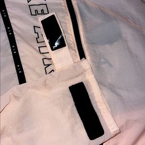 it’s a windbreaker for the gym , it’s a medium, and has adjustable straps